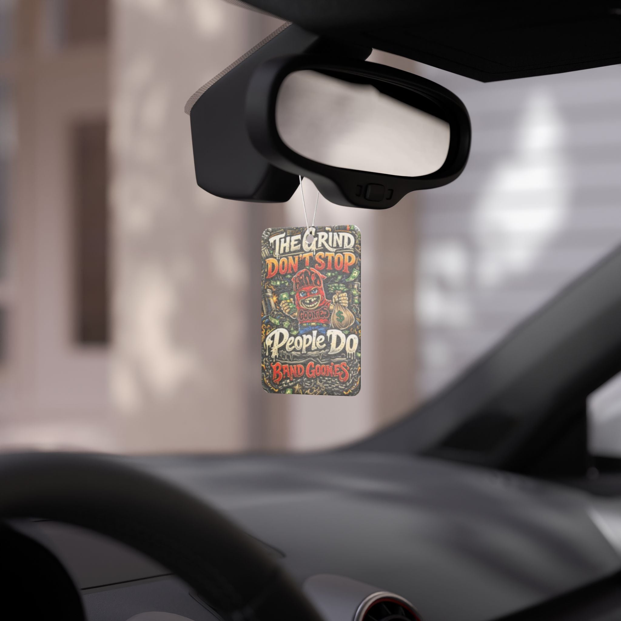 Car Air Freshener | Red Goonie "The Grind Don't Stop, People Do"